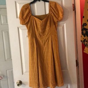 Yellow puff sleeved dress with pockets